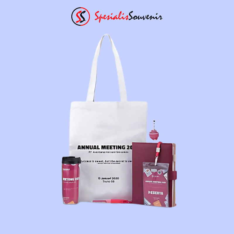 Contoh paket seminar kit lengkap berisi tas, notebook, dan pulpen custom berkualitas.